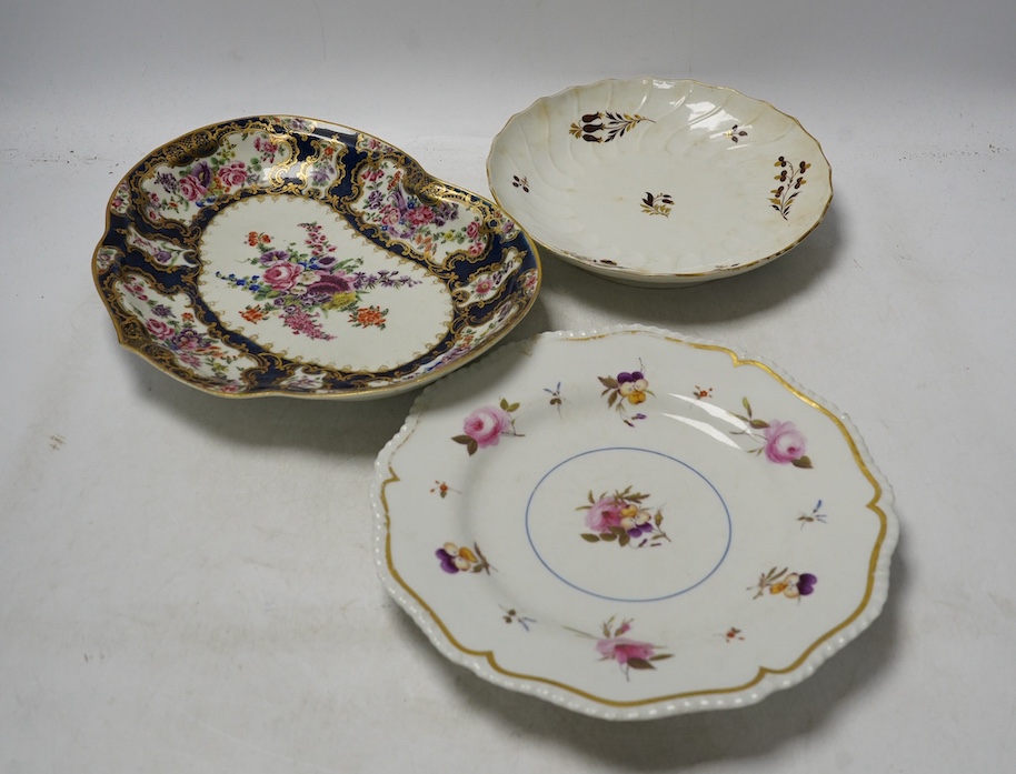 An 18th century Worcester dessert dish and two later Barr Flight & Barr plates, larger 26cm. Condition - worn